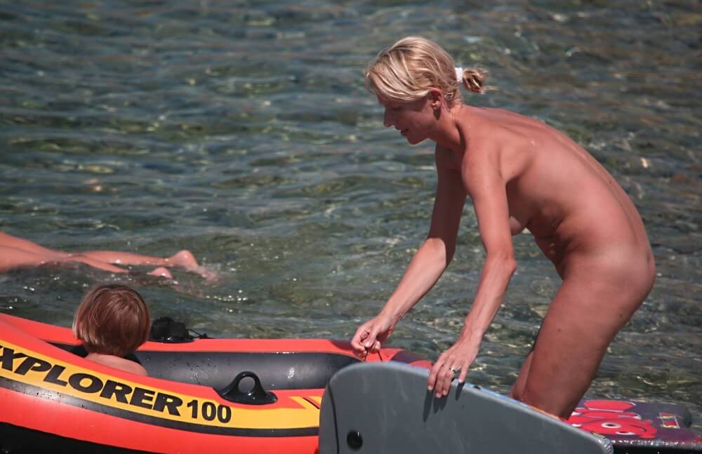 Red Boating for Two Nudists pics - A nudist values simplicity and naturalness in life