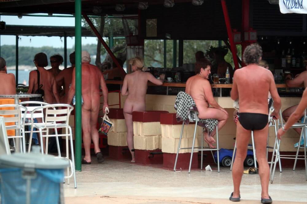 Outdoor diner view - Clothing is also a mask for a nudist