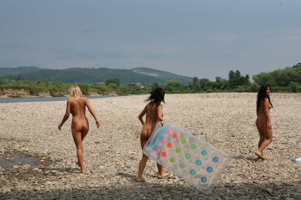 Naturist Park Floating On River photos - Nudity is an expression of natural beauty and harmony