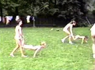 A nudist gathering at the stadium and sports - The culture of nudism promotes tolerance and mutual understanding