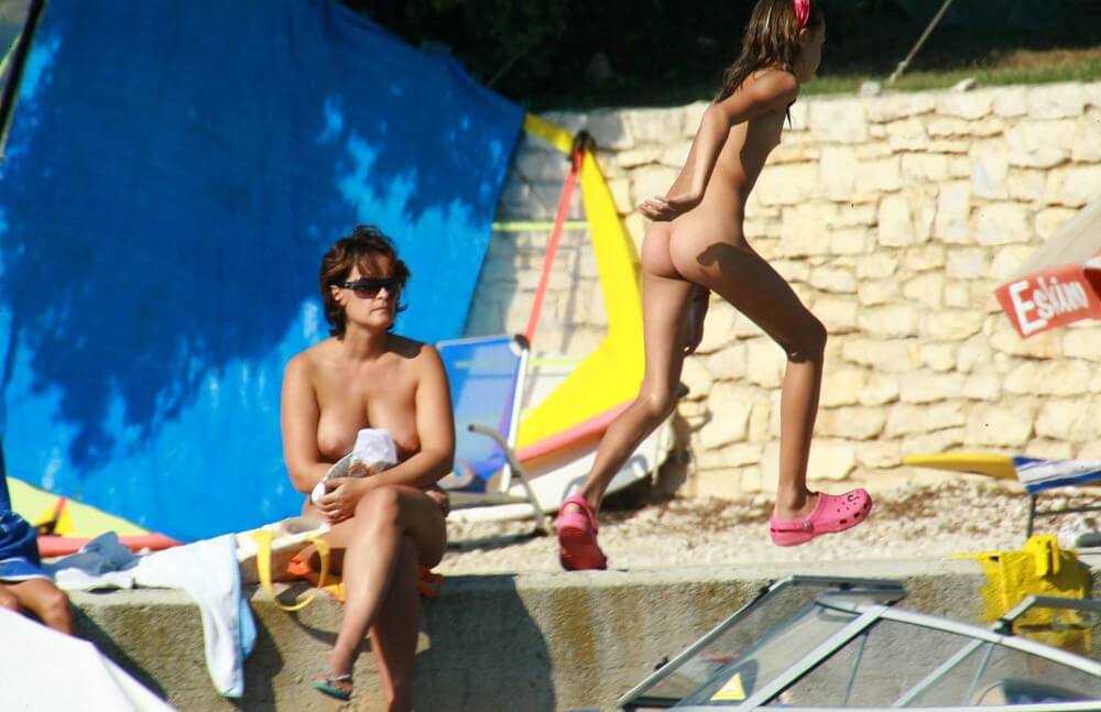 Bright Day Sun Tanning pics - Types of recreation in nudist and naturist resorts and parks