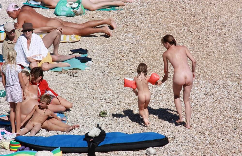 Orange Floaty Safety First Naturist pics - Naturists love nature and the environment