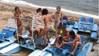 A group of naturists at sea - Naturism teaches us to accept ourselves and others without embarrassment