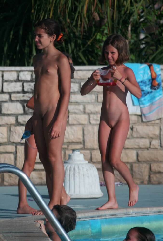 Two Poolside Nudist Girls pics - Admission Permitted Only in the Nude