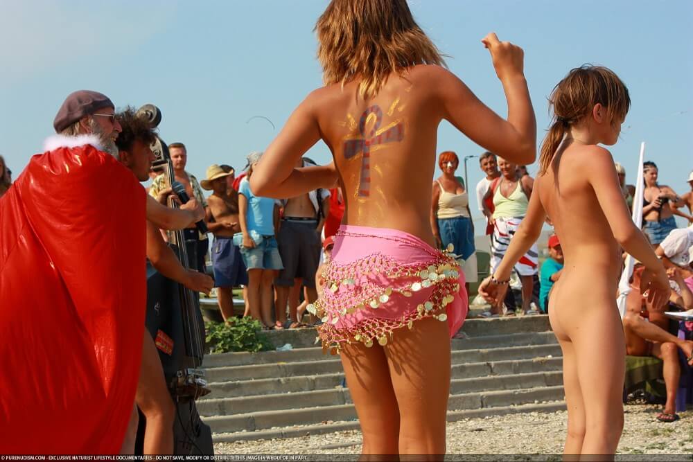 Colorful Carnival Dancing photos - Types of recreation in nudist destinations